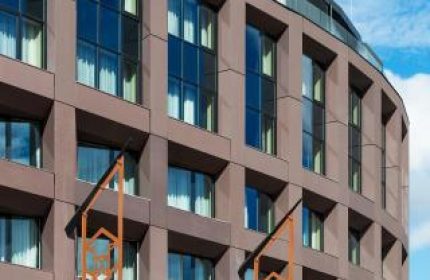 Hotel Clark Budapest exterior. Gay-friendly, pet-friendly hotel with modern architecture. A great choice for gay men visiting Budapest.