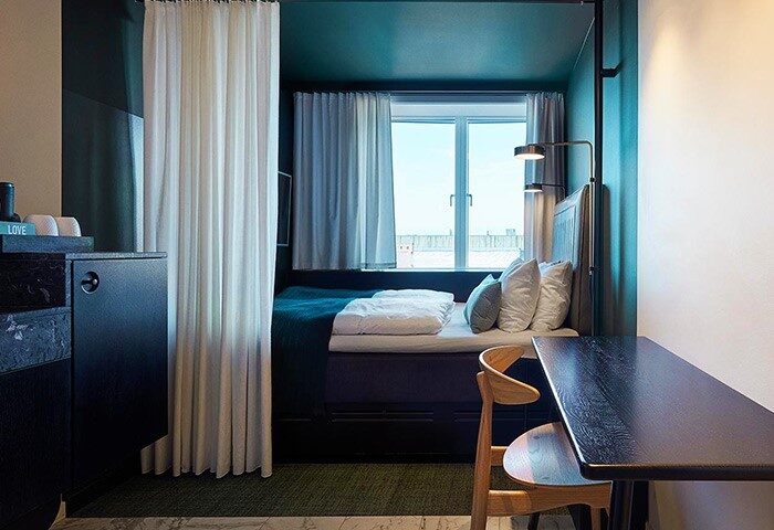 Hotel Danmark by Brøchner Hotels: A cozy, stylish room in a gay-friendly hotel. Features a bed, desk, and window with a view. Perfect for gay travel.