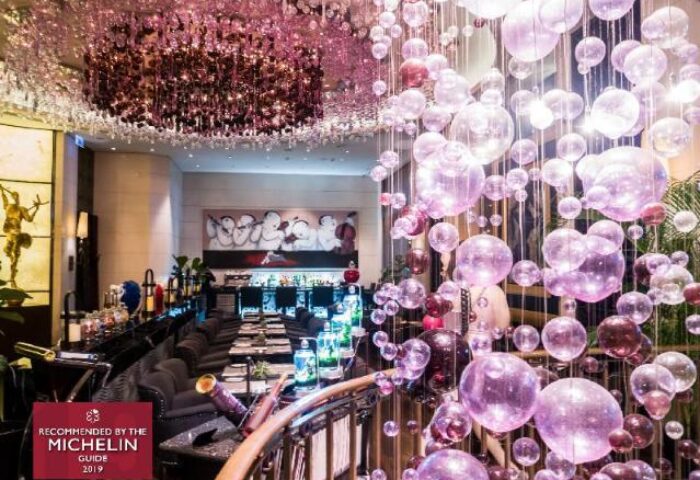 Hotel Eclat Taipei interior. Gay-friendly hotel bar with bubble chandelier and Michelin Guide recommendation. Upscale, stylish.
