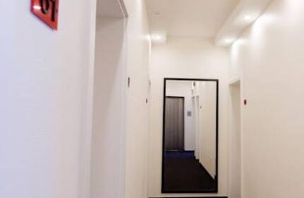 Hotel Esplanade Köln hallway. The gay-friendly hotel features modern design and clean lines. Room 61 is visible. A great choice for gay travel.