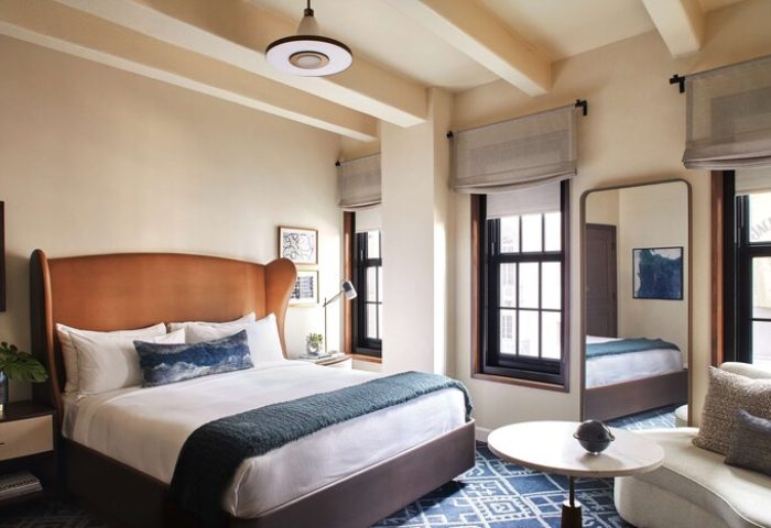 Hotel Figueroa, In The Unbound Collection By Hyatt room. Gay-friendly hotel with king bed, blue accents, and modern design. Great for gay travel.