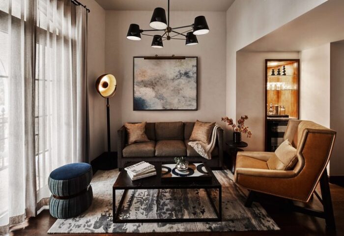 Hotel Figueroa, In The Unbound Collection By Hyatt living room. Gay-friendly hotel with stylish decor, sofa, and modern lighting.
