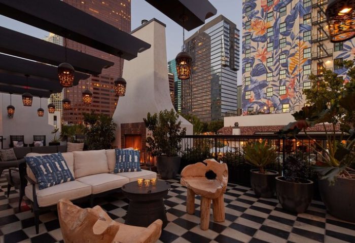 Hotel Figueroa, In The Unbound Collection By Hyatt rooftop patio. Gay-friendly hotel with fireplace, seating, and city view. Unique design.