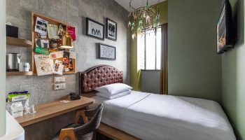 Hotel G Singapore gay-friendly hotel room. Single bed, desk, and decor. Modern design, comfortable space. Ideal for gay travelers in Singapore.