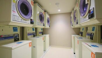 Hotel Gracery Shinjuku's laundry room. Coin-operated washing machines, convenient for gay travelers. A practical amenity at this gay-friendly hotel.