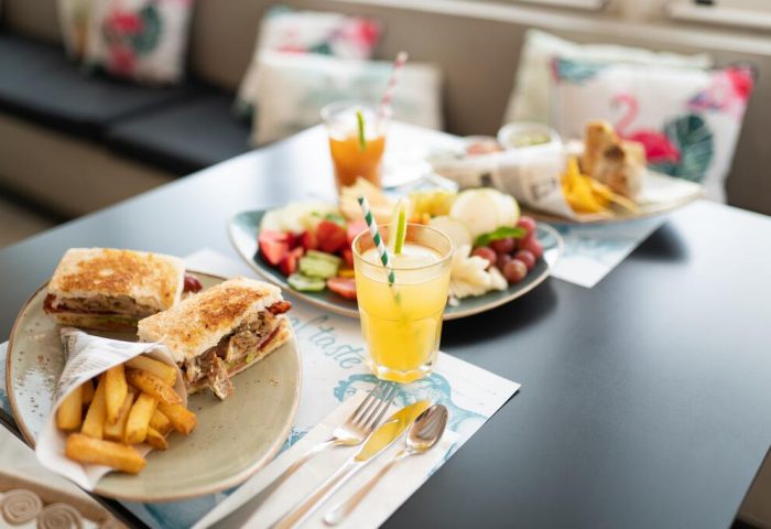 Hotel Gran Canaria Princess Adults Only breakfast. Playa del Ingles gay-friendly hotel food: sandwiches, fries, fruit, juice.