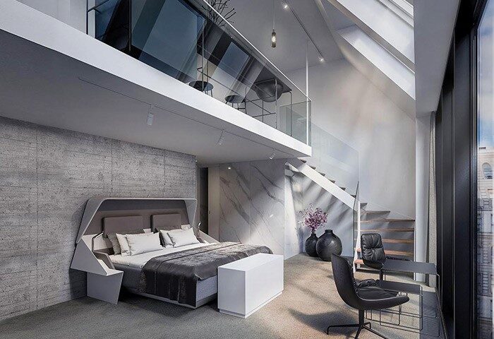Hotel Herman K by Brøchner Hotels: A gay-friendly hotel room with modern design, featuring a bed, staircase, and loft area. Upscale travel.