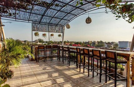 Rooftop bar at Gay-Friendly Hotel Horison Seminyak Bali. Outdoor seating with a view. Perfect for gay travelers in Bali.