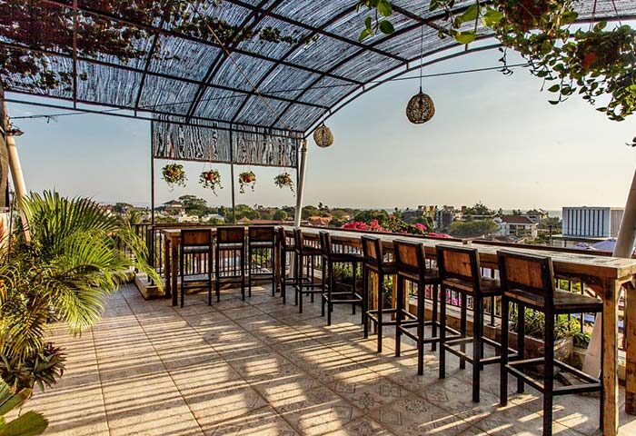 Rooftop bar at Gay-Friendly Hotel Horison Seminyak Bali. Outdoor seating with a view. Perfect for gay travelers in Bali.