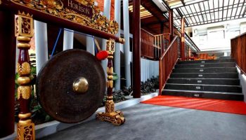 Horison Seminyak Bali hotel entrance with gong. Gay-friendly hotel in Bali, Indonesia, a great destination for gay men's travel.