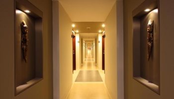 Hallway at Hotel Horison Seminyak Bali. Gay-friendly hotel with Balinese decor. Travel advice for gay men in Bali. Hotel interior.