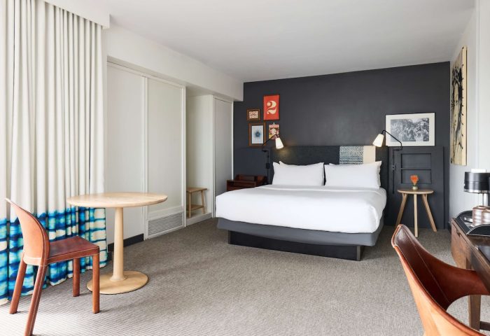 Hotel Kabuki, a gay-friendly Jdv By Hyatt hotel. Room interior with bed, desk, chairs, and decor. Modern design, comfortable stay.