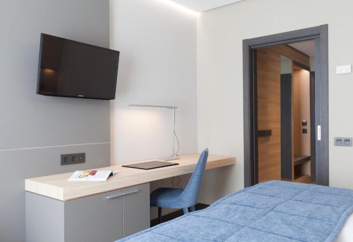 Hotel Liabeny gay-friendly room: TV, desk, chair, and bed. Modern design. Ideal for gay travelers. Comfortable & stylish. Madrid hotel.