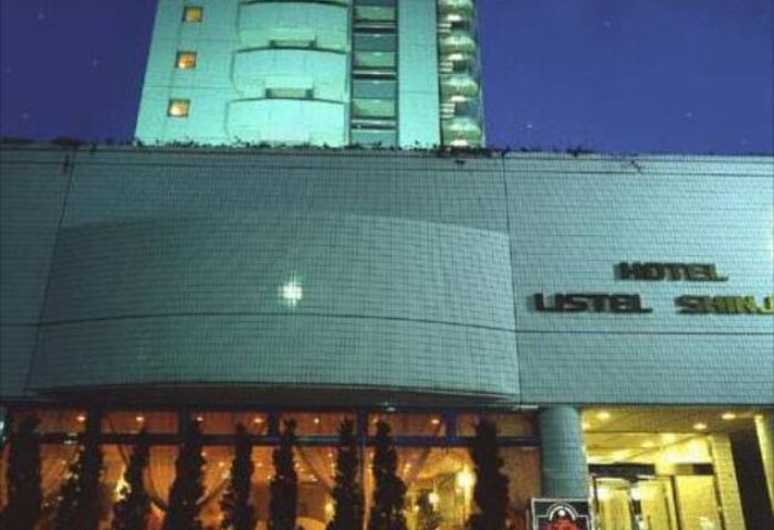 Hotel Listel Shinjuku, a gay-friendly hotel in Tokyo's Shinjuku district. Exterior view at night, showcasing its modern architecture and inviting entrance.