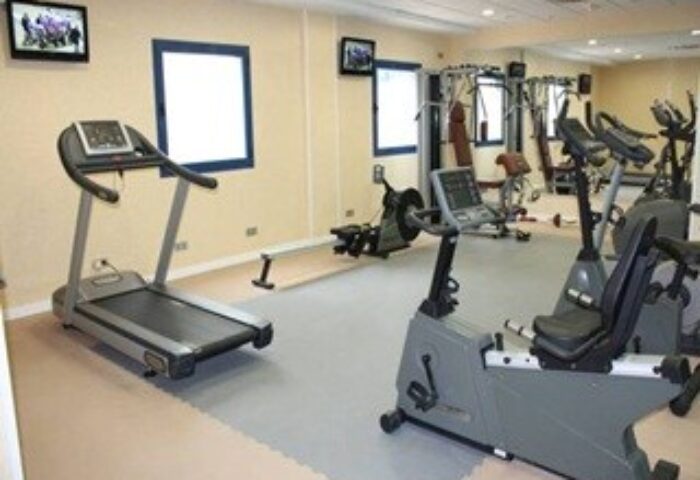Hotel Madeira Centro gym. Treadmill, rowing machine, and stationary bikes in the gay-friendly hotel's fitness center.