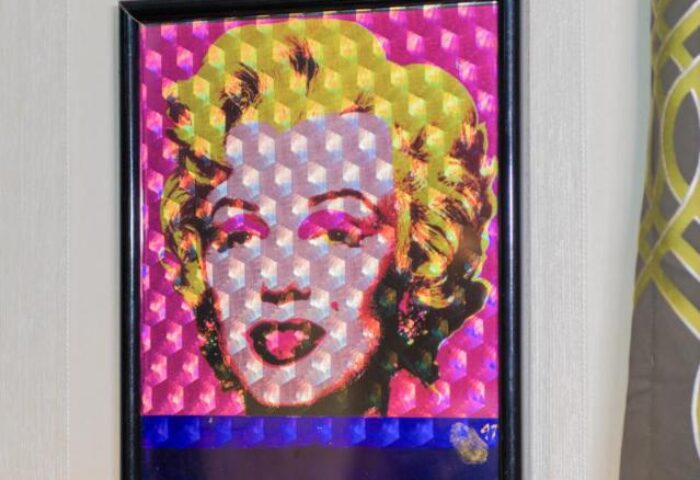 Pop art of Marilyn Monroe at Hotel Madera Hollywood, a gay-friendly hotel. The artwork features vibrant colors and a geometric pattern.