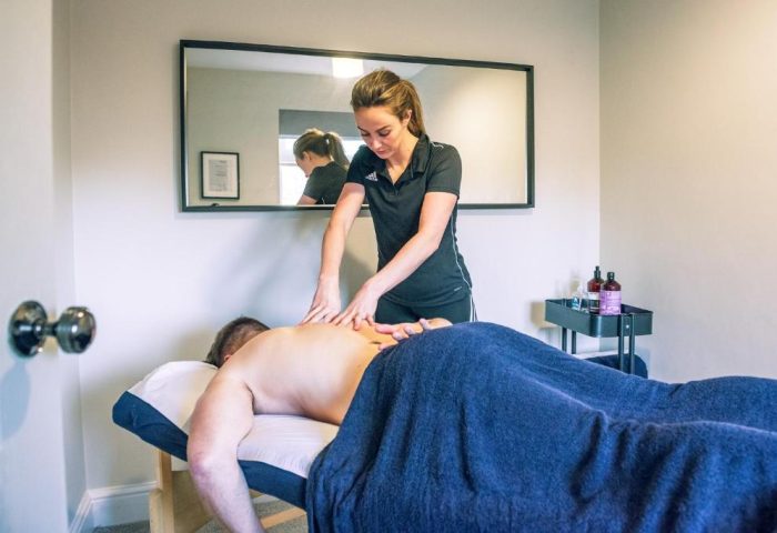 Hotel Memories Budapest: A gay man enjoys a relaxing massage. The gay-friendly hotel offers spa treatments for a memorable Budapest visit.