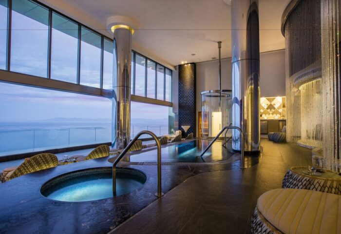 Hotel Mousai Cancun Adults Only All Inclusive gay-friendly hotel spa. Hot tub and ocean view. Luxury travel for gay men.