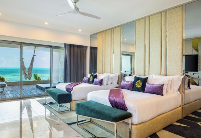 Hotel Mousai Cancun Adults Only All Inclusive room. Two beds, ocean view, hammock. Gay-friendly hotel for discerning travelers.