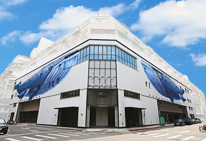 Exterior of Hotel PaPa Whale, a gay-friendly hotel. Building features a large whale mural. A great choice for gay men's travel in Taipei.