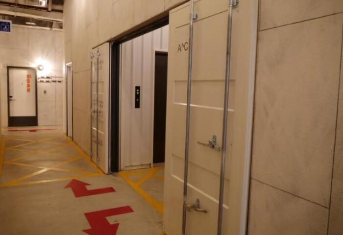 Hotel PaPa Whale's unique design. Hallway with container-like doors. Gay-friendly hotel with industrial chic decor. A must-see for gay travelers.