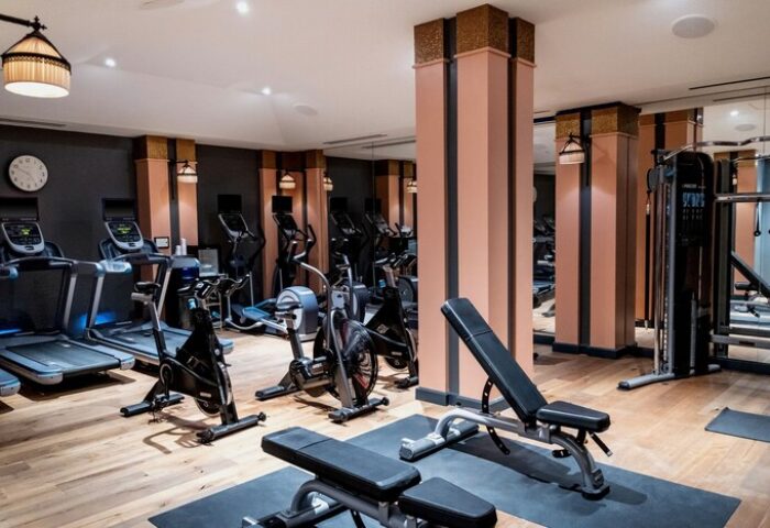 Hotel Per La, Autograph Collection gym. Treadmills, bikes, and weight machines in a modern, gay-friendly hotel. Fitness center.