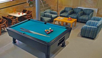 Hotel Piccadilly Sitges gay-friendly hotel: Billiard table and lounge area. A great place to relax and socialize in Sitges' gay scene.