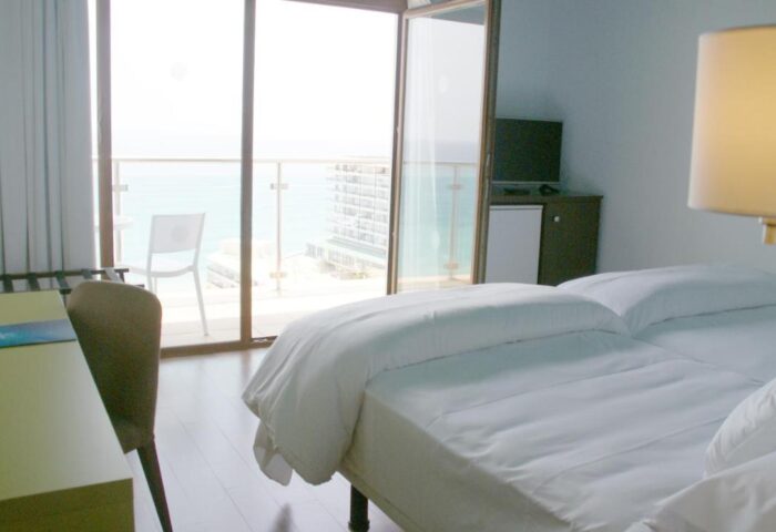 Hotel Ritual Torremolinos Adults Only room. Gay-friendly hotel with balcony and sea view. Clean, modern design. Perfect for gay travel.