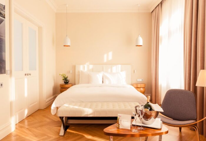 Hotel Sans Souci Wien gay-friendly room. Champagne bucket on table. Luxury hotel, Vienna, Austria. Gay travel, romantic getaway.