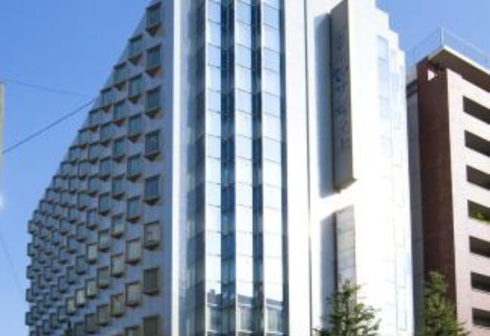 Hotel Sunlite Shinjuku, a gay-friendly hotel in Tokyo. Exterior view of the building with its unique architecture and modern design.