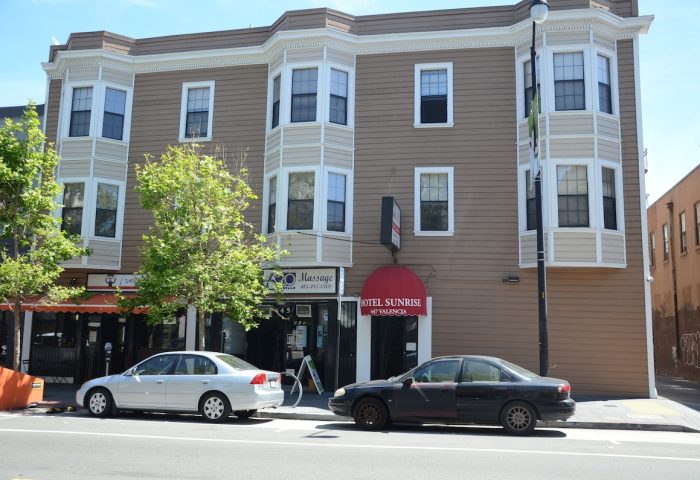 Hotel Sunrise, a gay-friendly hotel on Valencia Street. Brown building with bay windows. A welcoming choice for gay travelers.