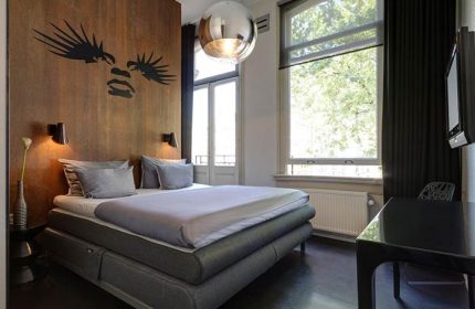 Hotel V Frederiksplein gay-friendly room. Modern design, queen bed, and stylish decor. A great choice for gay travelers in Amsterdam.