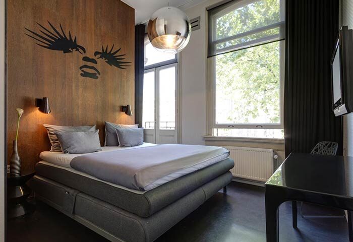 Hotel V Frederiksplein gay-friendly room. Modern design, queen bed, and stylish decor. A great choice for gay travelers in Amsterdam.