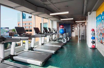 Hotel Zachary Chicago's gym. Treadmills, elliptical machines, & weights offer a workout with a view. Gay-friendly hotel fitness center.