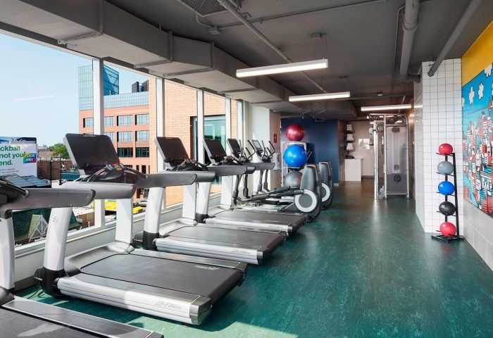 Hotel Zachary Chicago's gym. Treadmills, elliptical machines, & weights offer a workout with a view. Gay-friendly hotel fitness center.