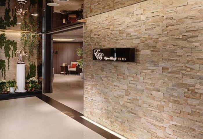 Humble House Taipei's stylish interior. Modern design, stone wall, and elegant decor. A gay-friendly hotel choice in Taipei for discerning travelers.