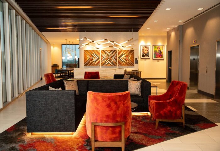 Hyatt Place Chicago/Wicker Park lobby. Gay-friendly hotel with modern design, lounge area, and artistic decor. Great for LGBTQ+ travelers.