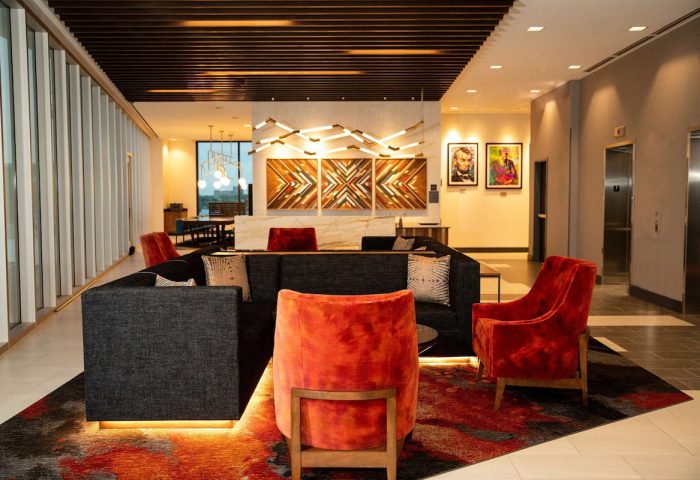 Hyatt Place Chicago/Wicker Park lobby. Gay-friendly hotel with modern design, lounge area, and artistic decor. Great for LGBTQ+ travelers.