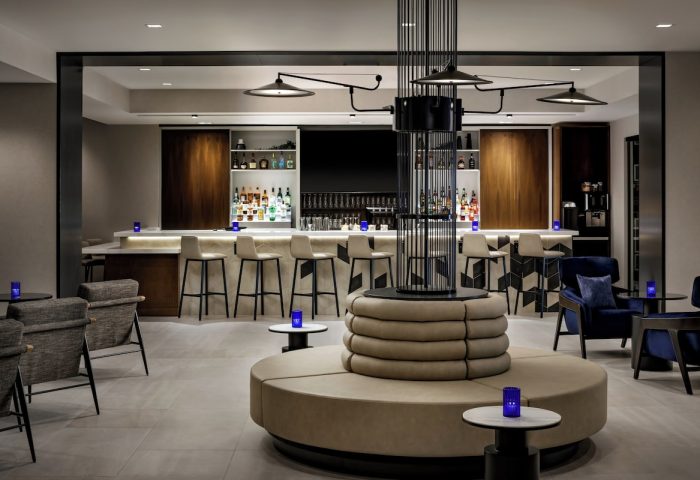 Hyatt Place Montreal Downtown's bar. This gay-friendly hotel features a stylish bar area with modern seating and a well-stocked bar.