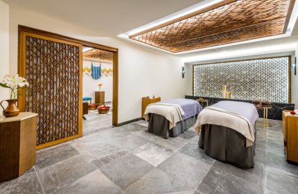 Hyatt Zilara Cancun's spa. Gay-friendly hotel featuring massage beds, patterned walls and wooden accents. A luxurious retreat for gay travelers.
