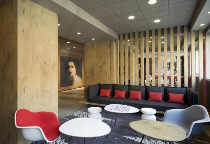 Ibis Milano Centro Hotel's stylish lounge area. Modern design, comfortable seating, and a welcoming atmosphere in this gay-friendly hotel.