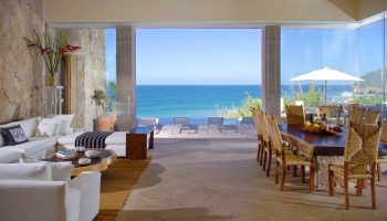 Imanta Resorts Punta De Mita gay-friendly hotel. Ocean view from luxury suite with seating and dining areas. Gay travel at its finest.