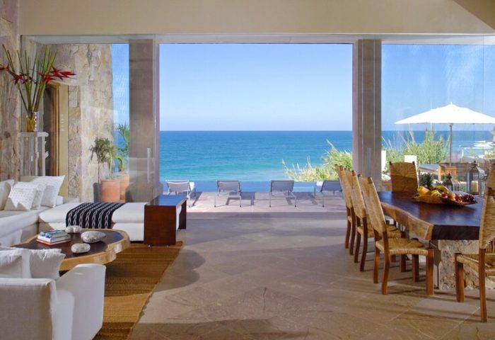 Imanta Resorts Punta De Mita gay-friendly hotel. Ocean view from luxury suite with seating and dining areas. Gay travel at its finest.