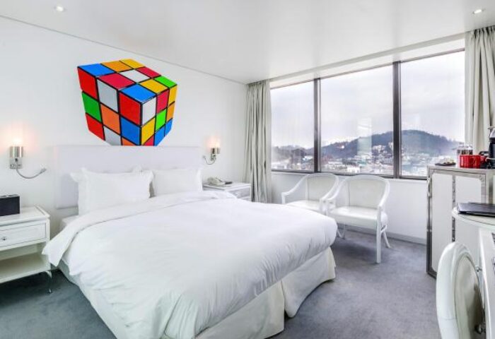 Imperial Palace Boutique Hotel room with Rubik's Cube art. Gay-friendly hotel offers stylish rooms, city views, and modern amenities for LGBTQ+ travelers.