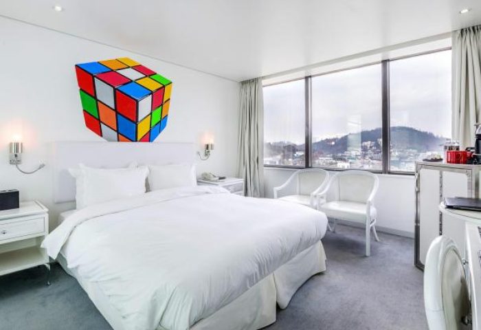 Imperial Palace Boutique Hotel room with Rubik's Cube art. Gay-friendly hotel offers stylish rooms, city views, and modern amenities for LGBTQ+ travelers.