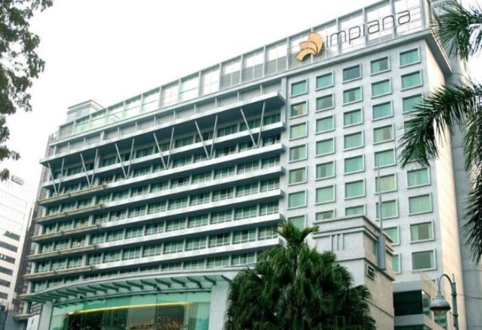 Facade of Impiana KLCC Hotel, a gay-friendly hotel in Kuala Lumpur. Modern building with multiple floors, ideal for gay travel in KL.