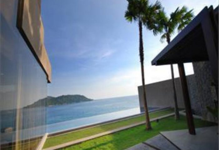 Impiana Private Villas Kata Noi, Phuket view. Gay-friendly hotel with infinity pool, ocean view, palm trees. Luxury travel for gay men.