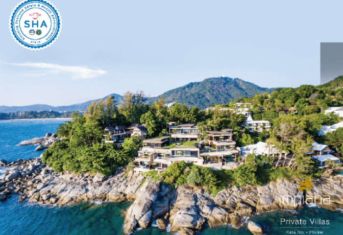 Impiana Private Villas Kata Noi, Phuket. Gay-friendly hotel with ocean views, lush greenery, and modern architecture on a rocky coast.