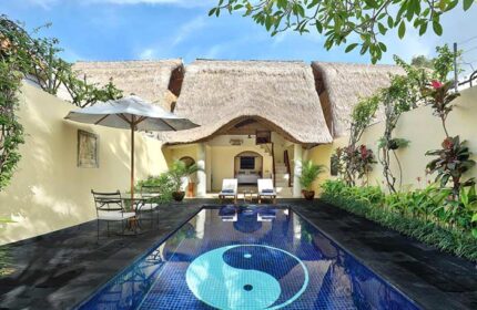 Impiana Private Villas Seminyak pool view. Gay-friendly hotel with Yin and Yang mosaic. Tropical villa, Seminyak, Bali. Luxury travel.