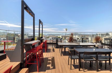 Infinity Hotel San Francisco, a Tapestry Collection by Hilton. Outdoor rooftop terrace seating with city views. Gay-friendly hotel.